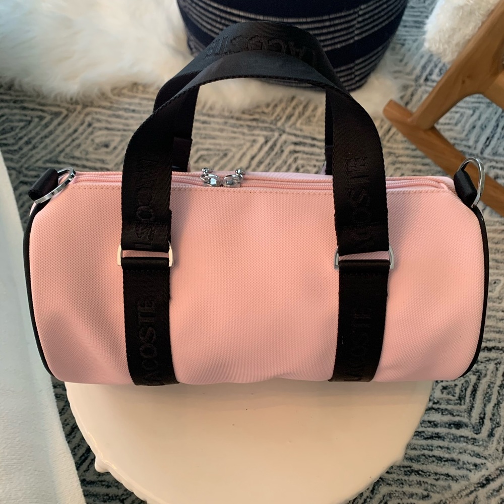 Lacoste pink barrel handbag